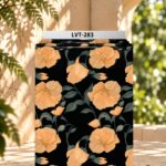 Elegant floral design featuring warm peach blooms with muted sage-green leaves on a deep black background.