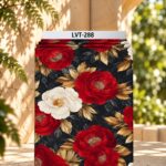 Dramatic floral design with bold red and ivory blooms, golden foliage, and deep charcoal leaves on a rich black background.