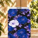 Striking floral design with vivid royal blue and soft white blooms, lavender foliage, and deep charcoal leaves on a rich black background.