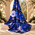 Striking floral design with vivid royal blue and soft white blooms, lavender foliage, and deep charcoal leaves on a rich black background. - Image 2