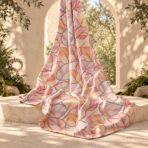 ⁦Elegant botanical design with layered leaves in soft blush, peach, beige, and coral tones, outlined with delicate contrasting details.⁩ - الصورة ⁦2⁩