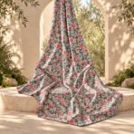 Delicate all-over floral print featuring small pink, soft blue, cream, and yellow blossoms on a muted dark background. - Image 2