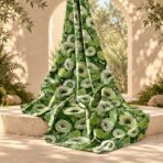 Lush botanical floral print featuring layered green and ivory blooms with dense foliage in rich shades of green. - Image 2