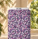 Charming all-over floral print with small lavender, purple, pink, and white blossoms scattered across a deep navy background.