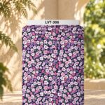 Charming all-over floral print with small lavender, purple, pink, and white blossoms scattered across a deep navy background.