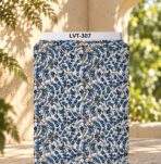 Elegant botanical print featuring delicate navy and soft blue blossoms intertwined with graceful branches on a warm ivory background.