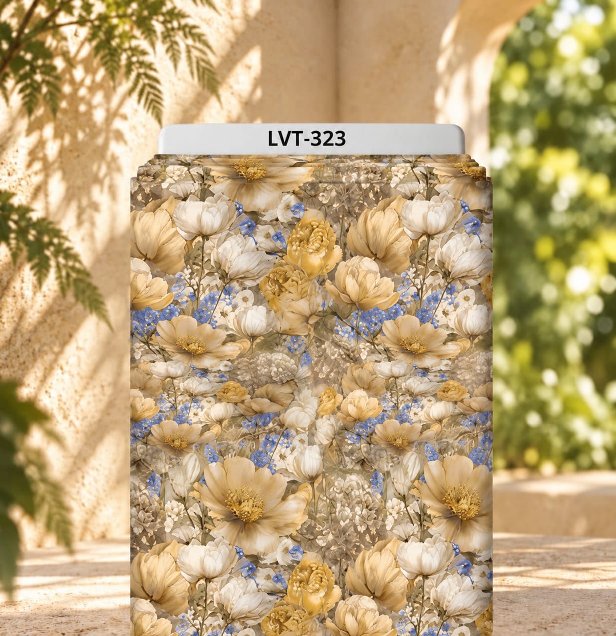 LVT-323 Elegant floral print with ivory and golden beige blooms, accented by delicate blue flowers on a soft taupe background. - Image 1
