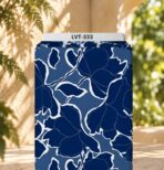 Bold navy floral silhouettes with white outlines on a soft dusty blue background.