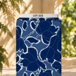 Bold navy floral silhouettes with white outlines on a soft dusty blue background.