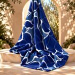 Bold navy floral silhouettes with white outlines on a soft dusty blue background. - Image 2