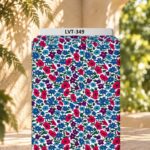 Vibrant red, blue, and purple florals scattered across a crisp white background.