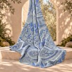 ⁦Intricate abstract motifs in layered shades of blue, grey, and ivory.⁩ - الصورة ⁦2⁩