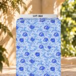 Elegant blue florals with flowing ornamental vines on a crisp white base.