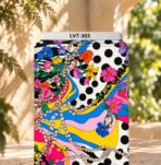 Vibrant florals, bold polka dots, and flowing colorful waves in a playful statement print.