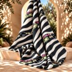 Bold zebra stripes accented with colorful jewel-inspired details. - Image 2