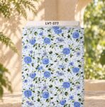 Delicate blue roses with green leafy vines on a soft white dotted background.