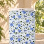 Delicate blue roses with green leafy vines on a soft white dotted background.