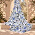 Delicate blue roses with green leafy vines on a soft white dotted background. - Image 2