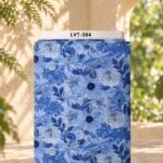 Elegant blue floral design with layered blossoms and delicate leaves in rich tonal shades.