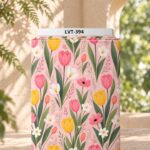Colorful tulips and delicate flowers on a soft pink background.