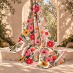 Vibrant colorful flowers and green leaves on a soft peach-pink background. - Image 2