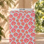 Playful pink and orange florals with colorful dots on a soft aqua background.