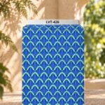 Repeating blue fan-shaped geometric motifs with fresh green accents
