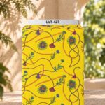 Colorful cords, tassels and delicate floral accents on a vibrant yellow background.