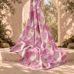 Elegant interlocking chain motif with delicate charm details on a soft pink and cream background. - Image 2