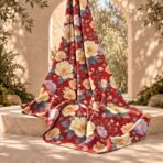 Elegant floral print with cream, peach and soft lilac blooms on a rich red background. - Image 2