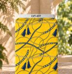 Luxury chain and tassel print in royal blue and gold on a vibrant yellow background.