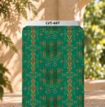 Ornamental heritage-inspired pattern with symmetrical motifs and delicate floral details on a rich green background.