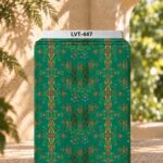 Ornamental heritage-inspired pattern with symmetrical motifs and delicate floral details on a rich green background.