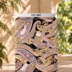 Luxurious multicolor paisley print on a bold black background with intricate ornamental details.